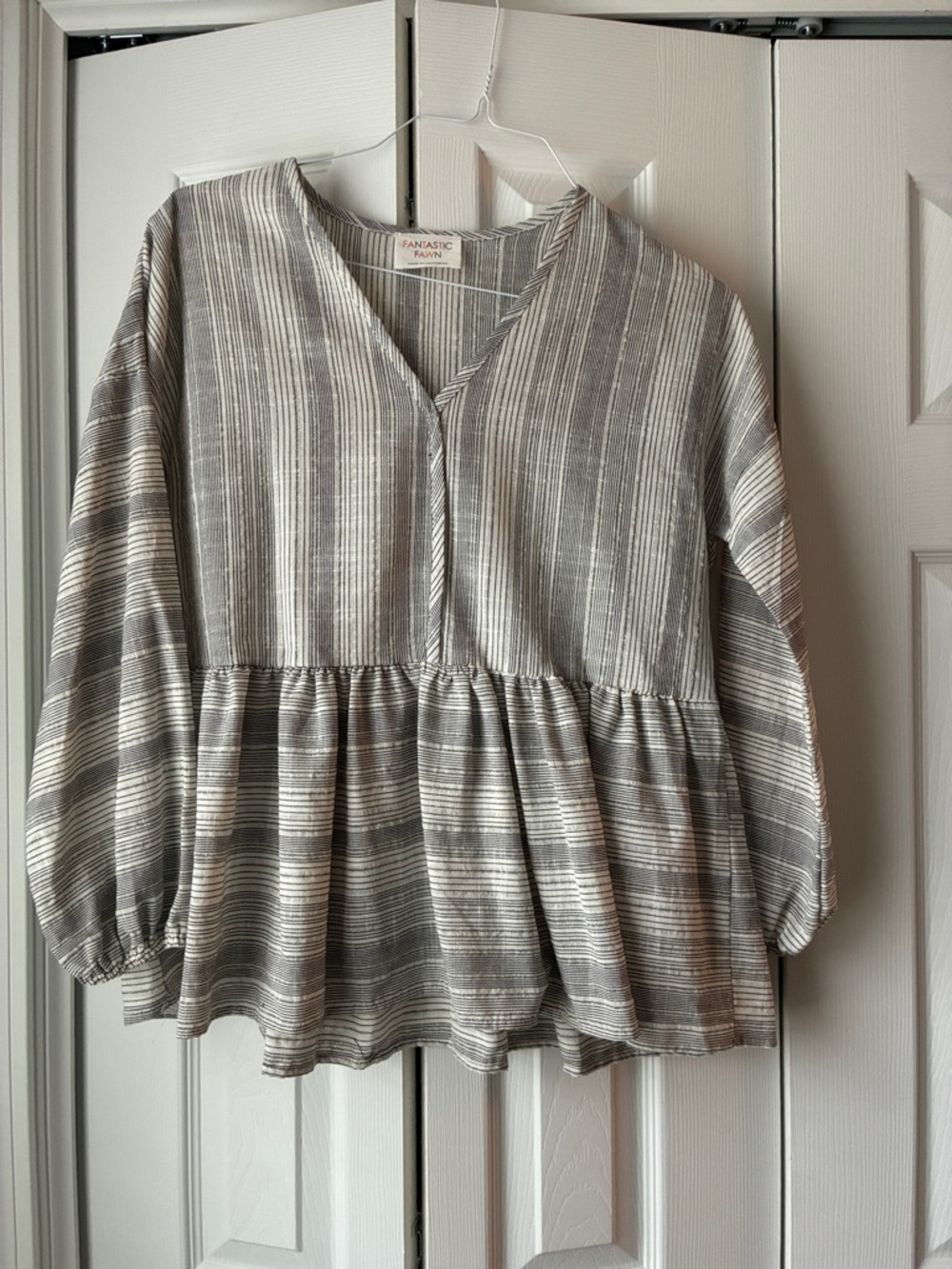 Fantastic Fawn Gray and Cream Striped Peplum Top
